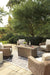 Beachcroft Beachcroft Fire Pit Table with Four Nuvella Swivel Lounge Chairs - Venta Furnishings (San Antonio,TX)