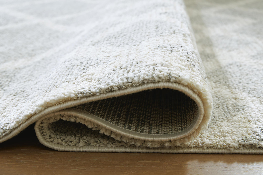 Unawick Large Rug - Venta Furnishings (San Antonio,TX)