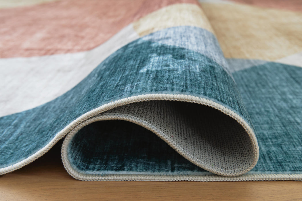 Chanleigh Washable 7'6" x 9'6" Area Rug - Venta Furnishings (San Antonio,TX)