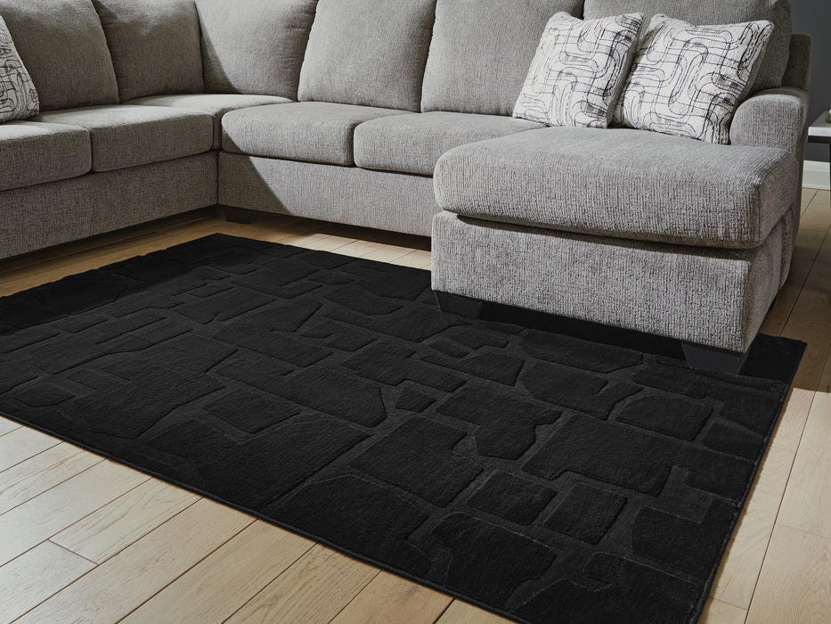 Gibbswell Washable 5' x 7' Area Rug - Venta Furnishings (San Antonio,TX)
