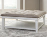 Kanwyn Upholstered Ottoman Coffee Table - Venta Furnishings (San Antonio,TX)